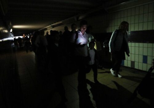 people walking in dark no lights